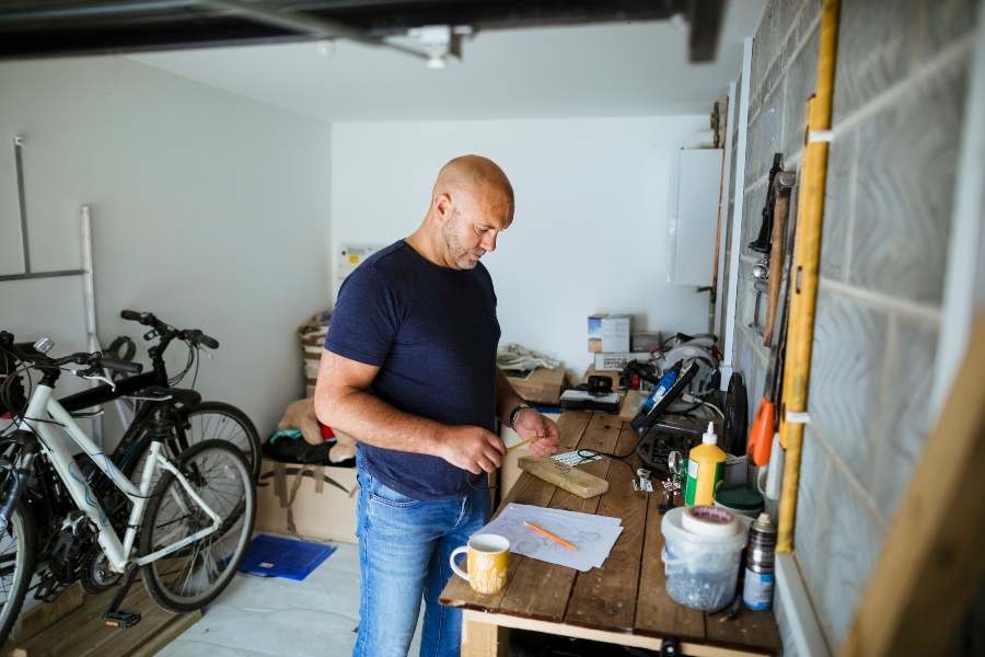 A person standing in a garage